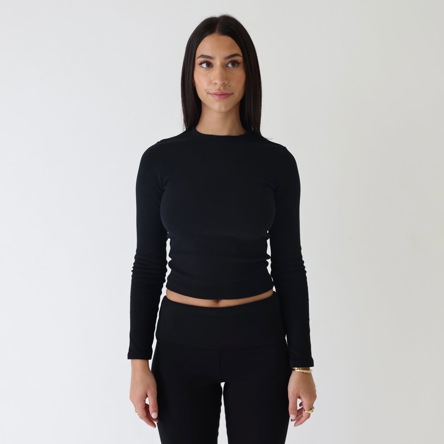 ‘Aleia’ Long sleeve tee in black - front view
